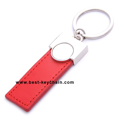 LEATHER KEY HOLDER WITH ROUND LASER LOGO