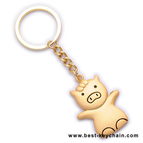 gold 3d pig keyrings